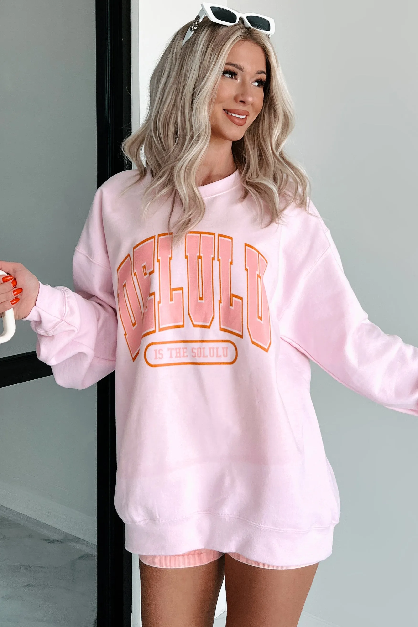 "Delulu Is The Solulu" Graphic Sweatshirt (Light Pink)